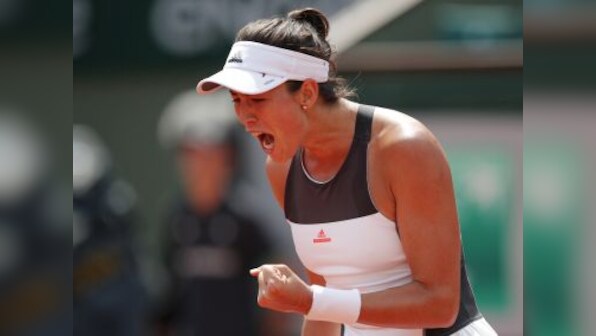 French Open 2017: Garbine Muguruza begins title defence with win, Caroline Wozniacki and Milos Raonic advance
