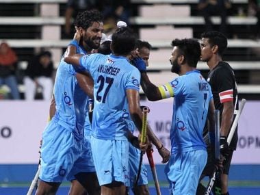 Indian players congratulate Rupinder Pal Singh after he scored against New Zealand. Image courtesy: Twitter/ @HockeyIndia