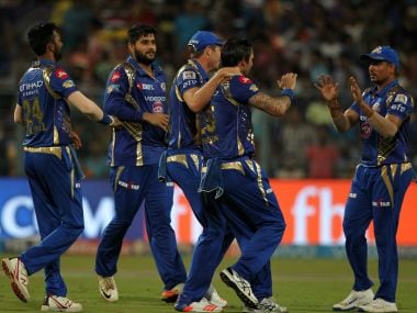 Mitchell Johnson of Mumbai Indians celebrates wicket of Gautam Gambhir with teammates. Sportzpics