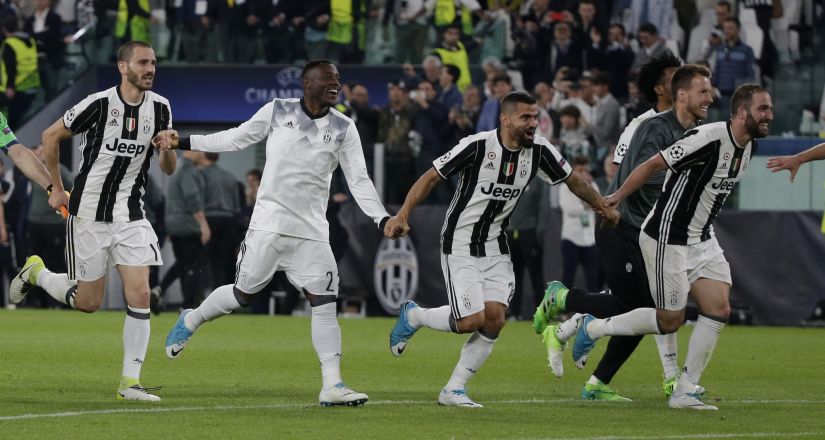 Juventus players celebrate after the semi-final win over Monaco. Reuters