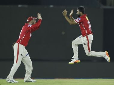 Rahul Tewatia of Kings XI Punjab celebrates the wicket of Kolkata Knight Riders' Robin Uthappa. SPortzpics
