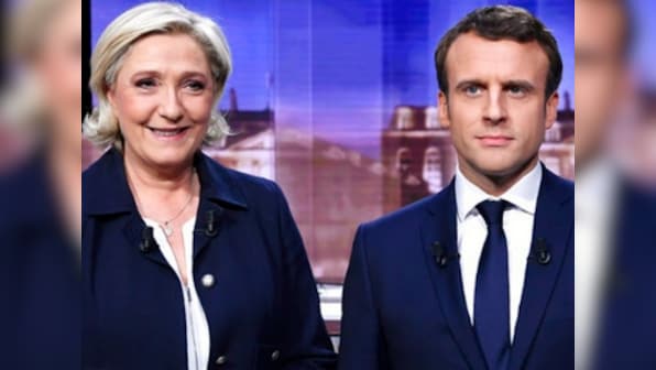 French Presidential Election 2017: As voting begins, Paris comes out for Emmanuel Macron