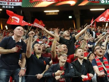 Manchester United's fans celebrate during the UEFA Europa League final football match Ajax Amsterdam v Manchester United on May 24, 2017 at the Friends Arena in Solna outside Stockholm. / AFP PHOTO / SOREN ANDERSSON