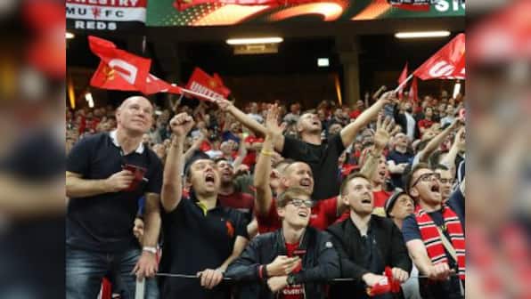 Europa League final: Manchester United fans 'defiant' despite tragedy at home
