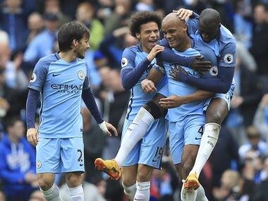 Manchester City's Vincent Kompany celebrates scoring his side's second goal. AP