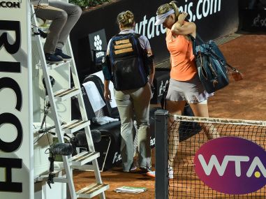 Maria Sharapova leaves the court after retiring hurt in the match against Mirjana Lucic-Baroni. AFP