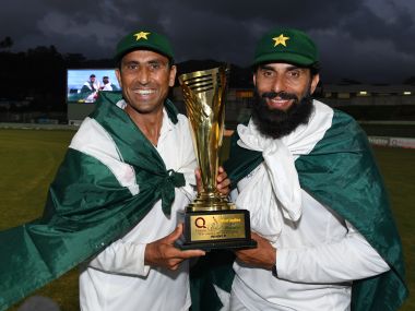 Younis Khan (L) and captain Misbah-ul-Haq (R) celebrate with the series trophy. AFP