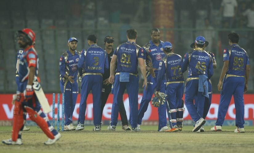 Mumbai Indians players celebrate their win over Delhi Daredevils by a margin of 146 runs. Sportzpics