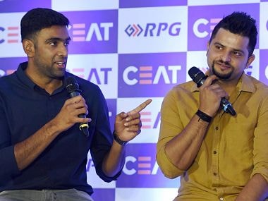 R Ashwin and Suresh Raina during the CEAT Cricket Awards in Mumbai. PTI
