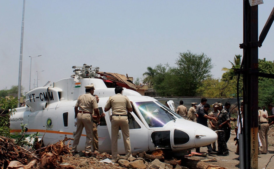 The helicopter, which had six persons on board including two crew members, got entangled in overhead wires while landing at Nilanga area where the chief minister had held a programme. PTI The helicopter, which had six persons on board including two crew members, got entangled in overhead wires while landing at Nilanga area where the chief minister had held a programme. PTI