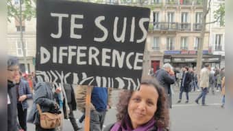 At Paris’ May Day march, presidential candidates Marine Le Pen and Emmanuel Macron get stick