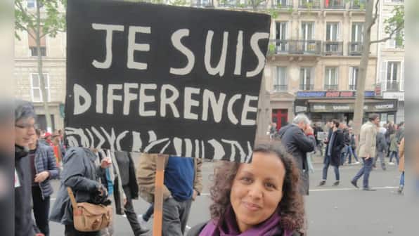 At Paris’ May Day march, presidential candidates Marine Le Pen and Emmanuel Macron get stick
