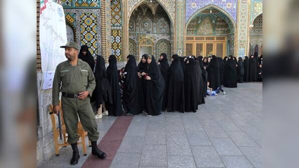 Hassan Rouhani defeats Ebrahim Raisi in Iran presidential elections, reports state TV