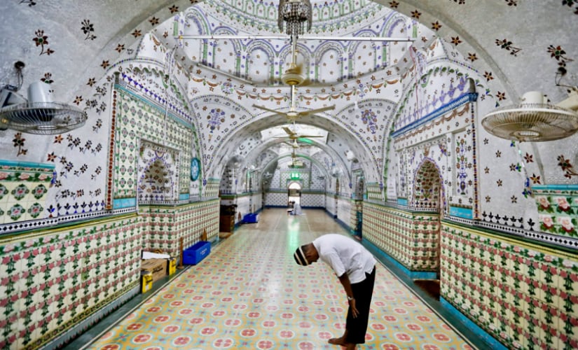 A Bangladeshi Muslim man prays at a Mosque during Ramzan in Dhaka on Wednesday. Muslims throughout the world are marking the holy month of Ramzan, during which they fast from dawn till dusk. AP