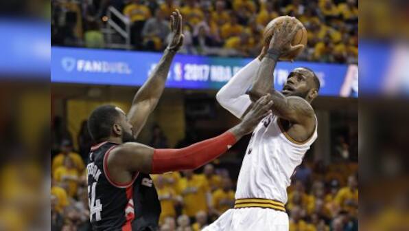 NBA playoffs: LeBron James powers Cavaliers to win over Raptors, Rockets rout Spurs in opener