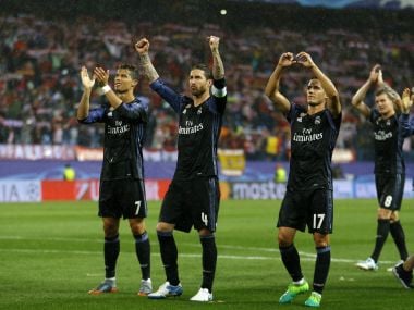 Real Madrid players wave to their fans after progressing to the Champions League final. AP