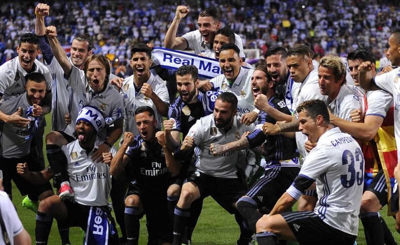 Real Madrid's players celebrate winning the Spanish league for the first time in five years. AP