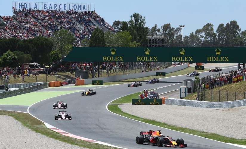 (L to R) Force India's Sergio Perez and Esteban Ocon, and Red Bull's Daniel Ricciardo during the Spanish Grand Prix. AFP