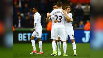 Premier League: Swansea City climb out of relegation zone, Sunderland sink Hull City