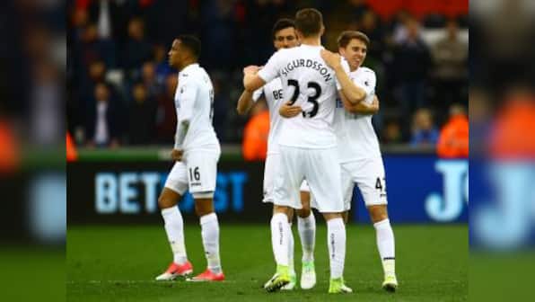 Premier League: Swansea City climb out of relegation zone, Sunderland sink Hull City