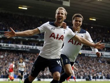 Tottenham Hotspur's Harry Kane, front, celebrates after scoring against Arsenal. AP