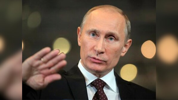 Russian President Vladimir Putin urges world to fight terror as Russia marks WWII victory