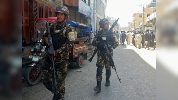 Taliban militants kill 11 Afghanistan soldiers at a military base in Kandhar