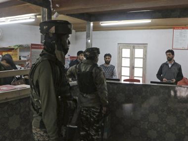 Bank robberies in Kashmir: After numbers of incidents increase, locals call looters 'government gunmen' Bank robberies in Kashmir: After numbers of incidents increase, locals call looters 'government gunmen'
