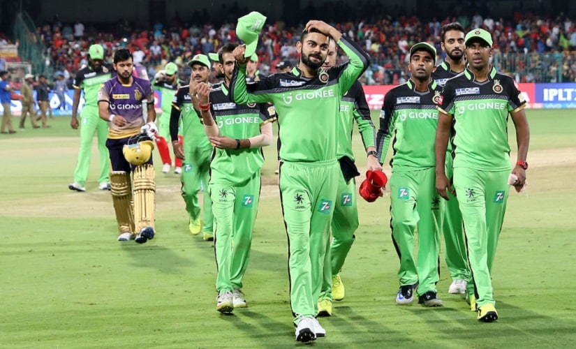 Royal Challengers Bangalore team, in their green jerseys, after losing to KKR. Sunil Narine scored a fifty in the game. Sportzpics