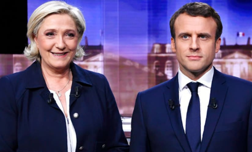 French presidential election candidates Marine Le Pen (left) and Emmanuel Macron. AP