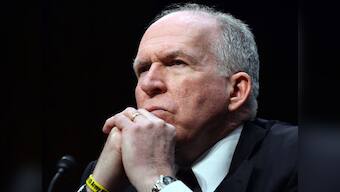 Vladimir Putin manipulating Donald Trump with flattery, says former CIA director John Brennan