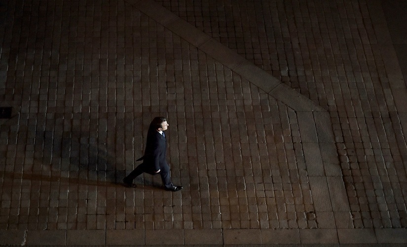 Incoming French president Emmanuel Macron walks towards the stage to address his supporters at the Louvre in Paris. AP