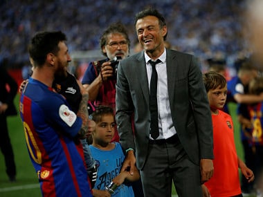 File photo of Barcelonas Lionel Messi and Luis Enrique. Reuters