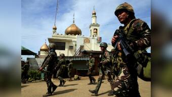 Philippines deploys commandoes, attack helicopters to retake city from Islamic State-linked rebels