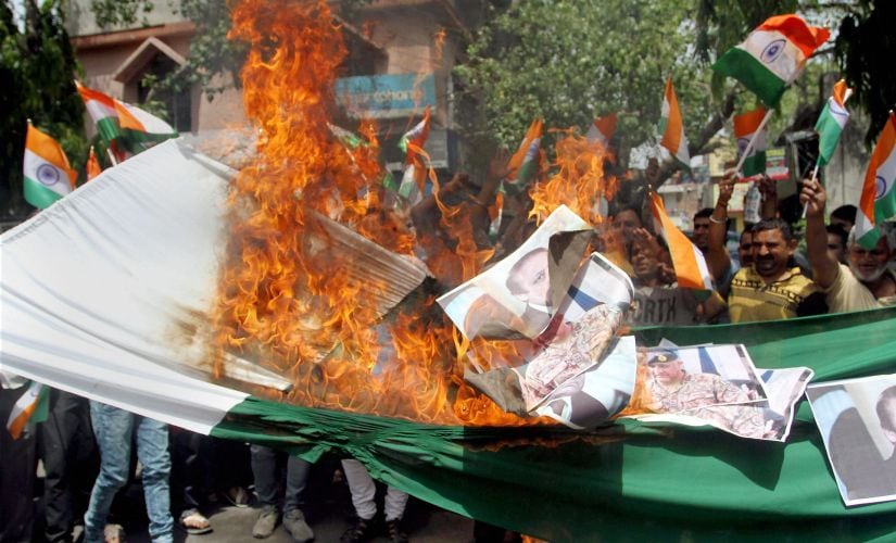 Shiv Sena activists protesting against beheading of the Indian soldiers in Jammu. PTI