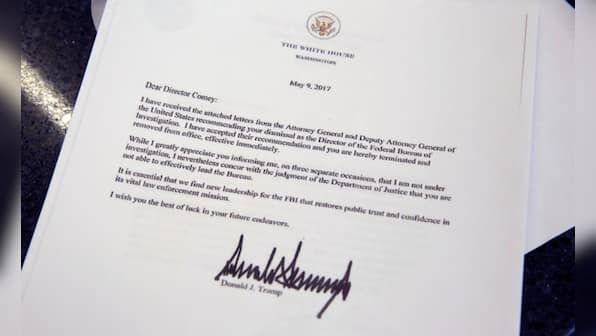 Trump sacks Comey - FBI chief watched it on telly, the “room went quiet”