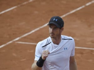 Andy Murray celebrates after scoring during his tennis match against Martin Klizan . AFP