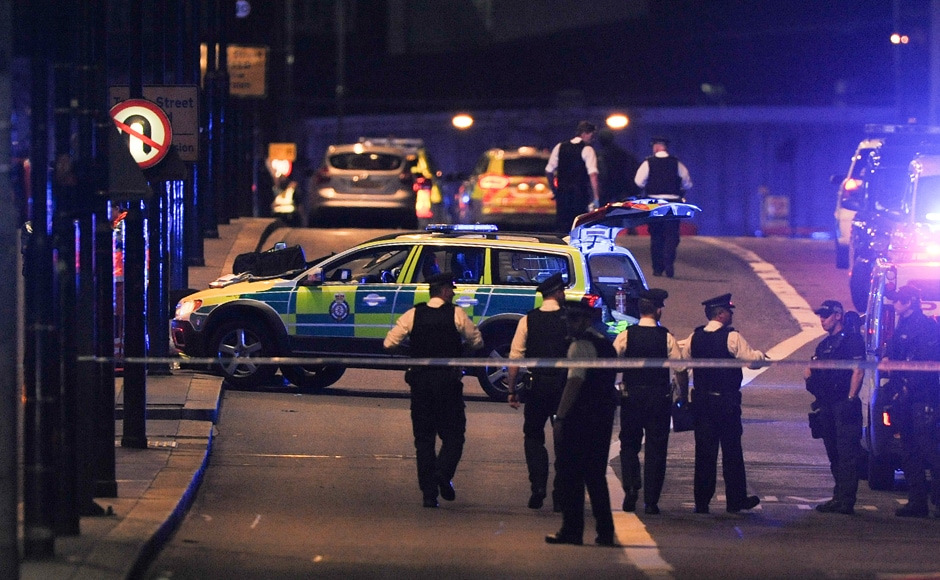 Police officers gather at the scene of the attack on Saturday. AFP Police officers gather at the scene of the attack on Saturday. AFP