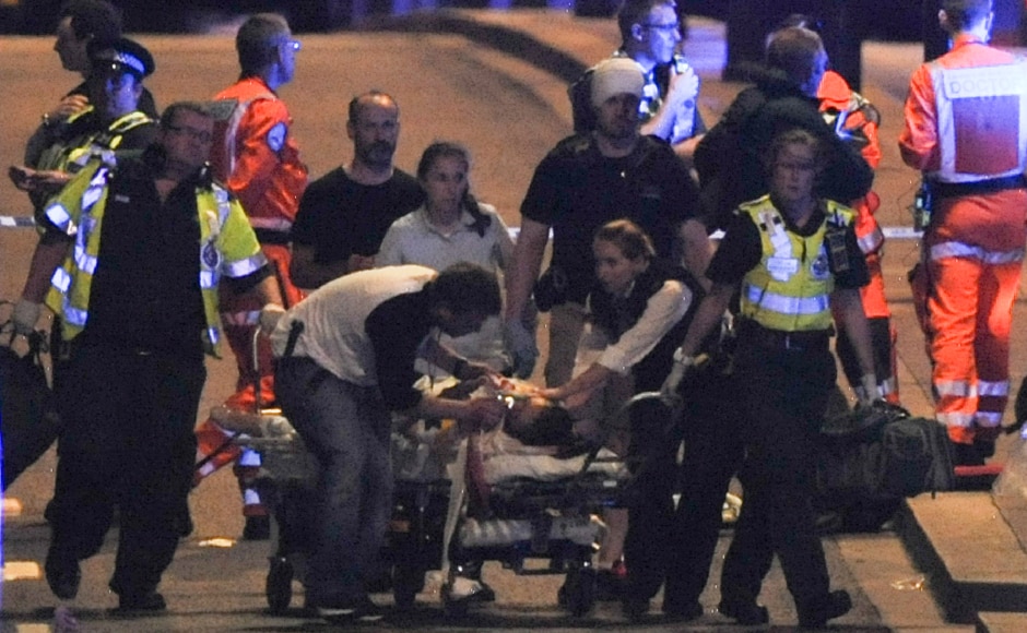 Police and members of the emergency services attend to victims. A total of six civilians are reported to have died in the attack. AFP Police and members of the emergency services attend to victims. A total of six civilians are reported to have died in the attack. AFP