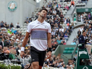 Serbia's Novak Djokovic reacts during his tennis match against Austria's Dominic Thiem at the Roland Garros 2017 French Open on June 7, 2017 in Paris. AFP