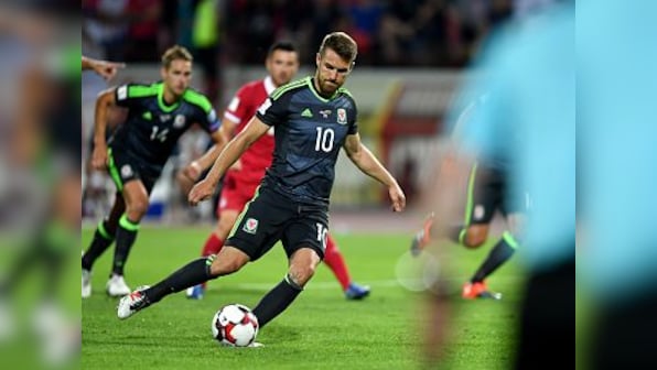 World Cup qualifiers: Wales gain point at Serbia; Spain Italy notch up easy wins