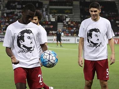 World Cup qualifier: Qatar risk FIFA disciplinary action after players show T-shirt in support of countrys emir