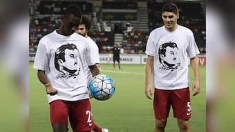 World Cup qualifier: Qatar risk FIFA disciplinary action after players show T-shirt in support of country's emir