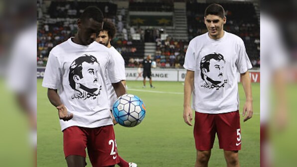 World Cup qualifier: Qatar risk FIFA disciplinary action after players show T-shirt in support of country's emir