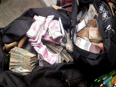 Police has also seized large amounts of cash from the raids. PTI