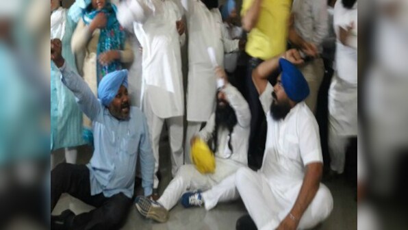 Ruckus in Punjab Assembly: AAP MLAs thown out of House; four faint outside after scuffle