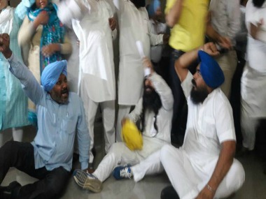 Ruckus in Punjab Assembly: AAP MLAs thown out of House; four faint outside after scuffle Ruckus in Punjab Assembly: AAP MLAs thown out of House; four faint outside after scuffle