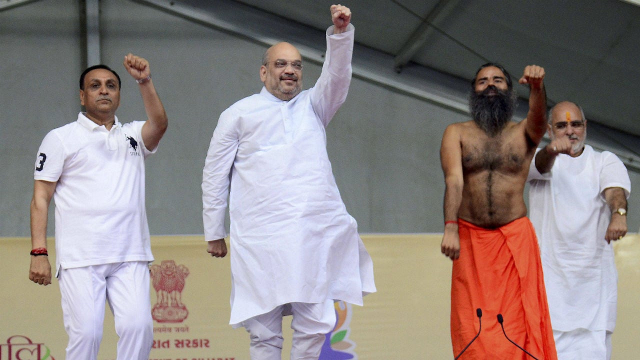 Amit Shah shed body weight by doing yoga but gained political weight: Ramdev-Politics  News , Firstpost