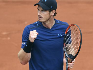 Andy Murray celebrates after winning a point against Juan Martin del Potro during their match. AFP