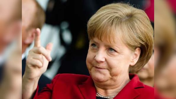 Germany goes to polls today as Chancellor Angela Merkel set to win historic fourth term